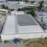 Pannelli fotovoltaici SunPower su capannone con tetto con copertura a shed in Cifra Spa