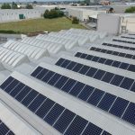 Pannelli fotovoltaici SunPower su capannone con tetto con copertura a shed in Cifra Spa