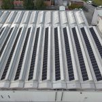 Pannelli fotovoltaici SunPower su capannone con tetto con copertura a shed in Cifra Spa