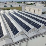 Pannelli fotovoltaici SunPower su capannone con tetto con copertura a shed in Cifra Spa